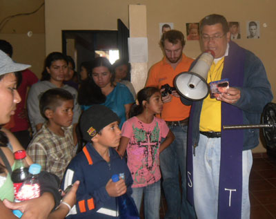 Zúñiga and members of the community join in blessing a new gym at the Outreach Center for My Neighborhood.