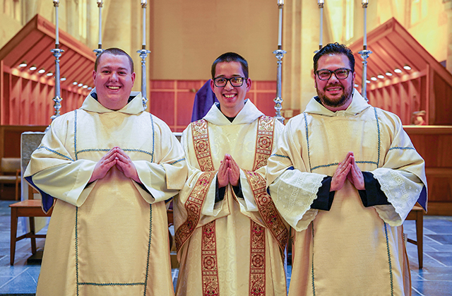 Father Paschal Pautler, O.S.B., Father Dominic Lee, O.S.B., and Father Pachomius Alvarado, O.S.B. are wearing the sacred vestments of a deacon. 